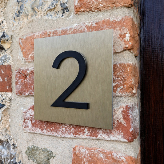 Bronze House Number Plaque - matt black acrylic numbers mounted onto bronze