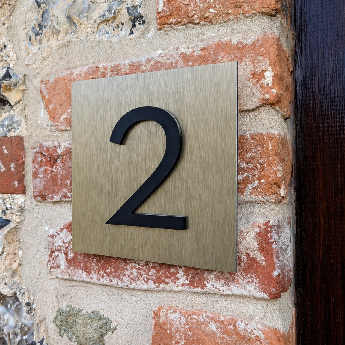 Bronze House Number Plaque - matt acrylic numbers mounted onto brushed bronze
