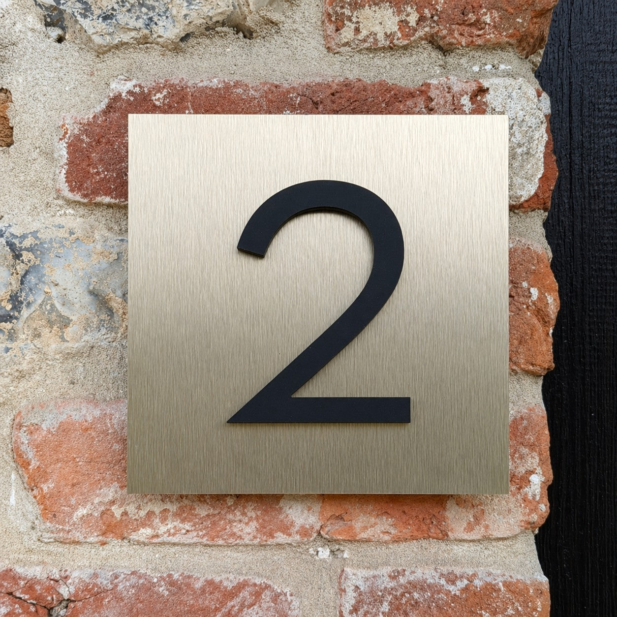 Bronze House Number Plaque - matt acrylic numbers mounted onto brushed bronze