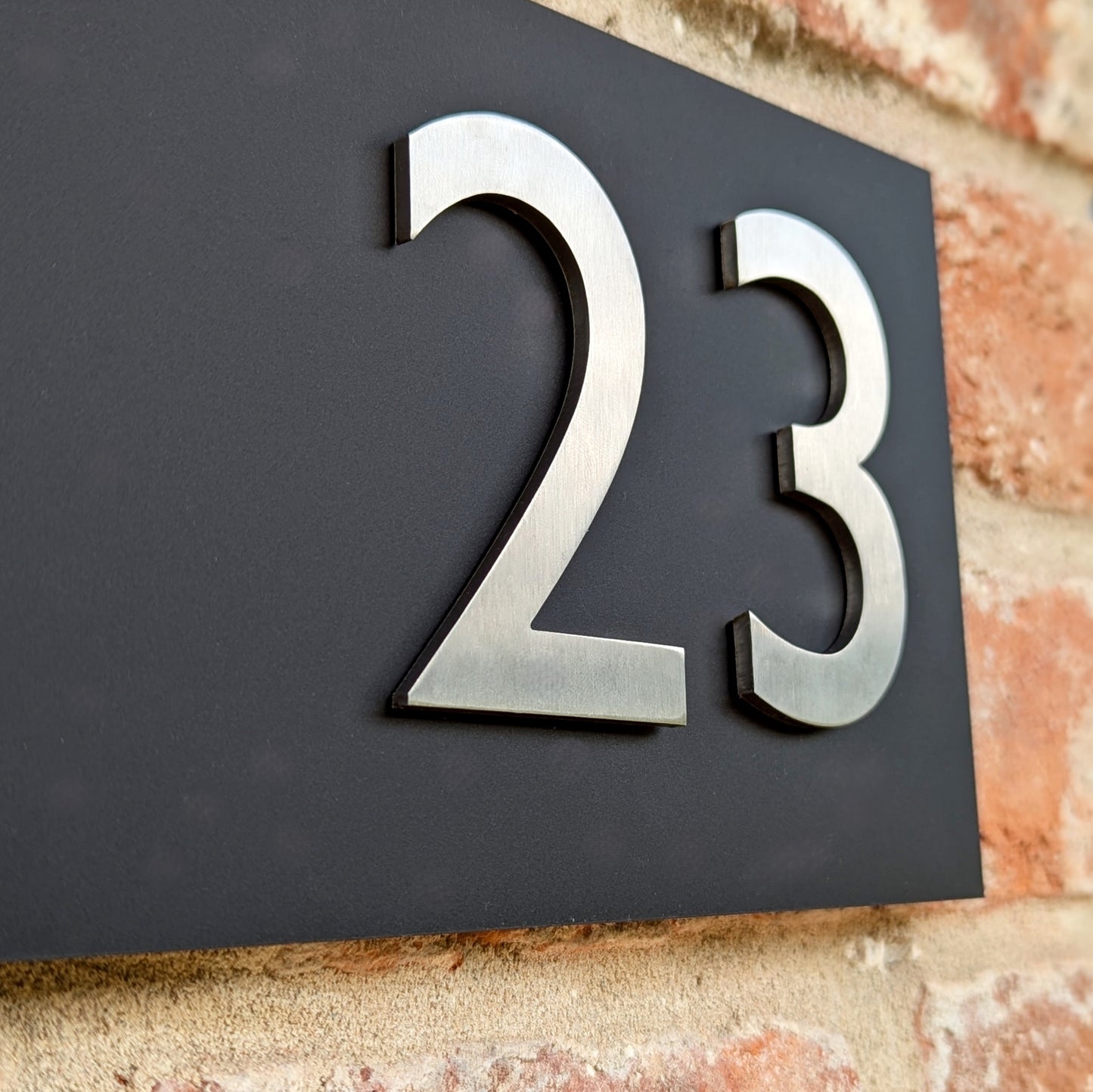 Stainless Steel House Numbers, mounted onto matt black sign, optional arrows and hyphens. small size