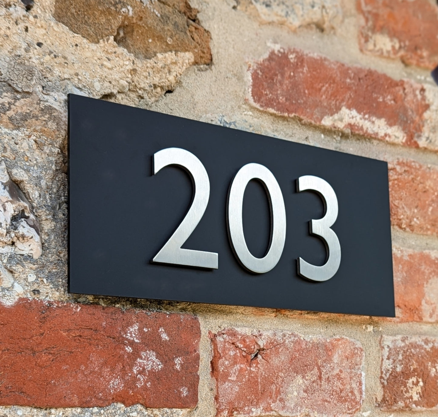 Stainless Steel House Numbers, mounted onto matt black sign, optional arrows and hyphens. small size