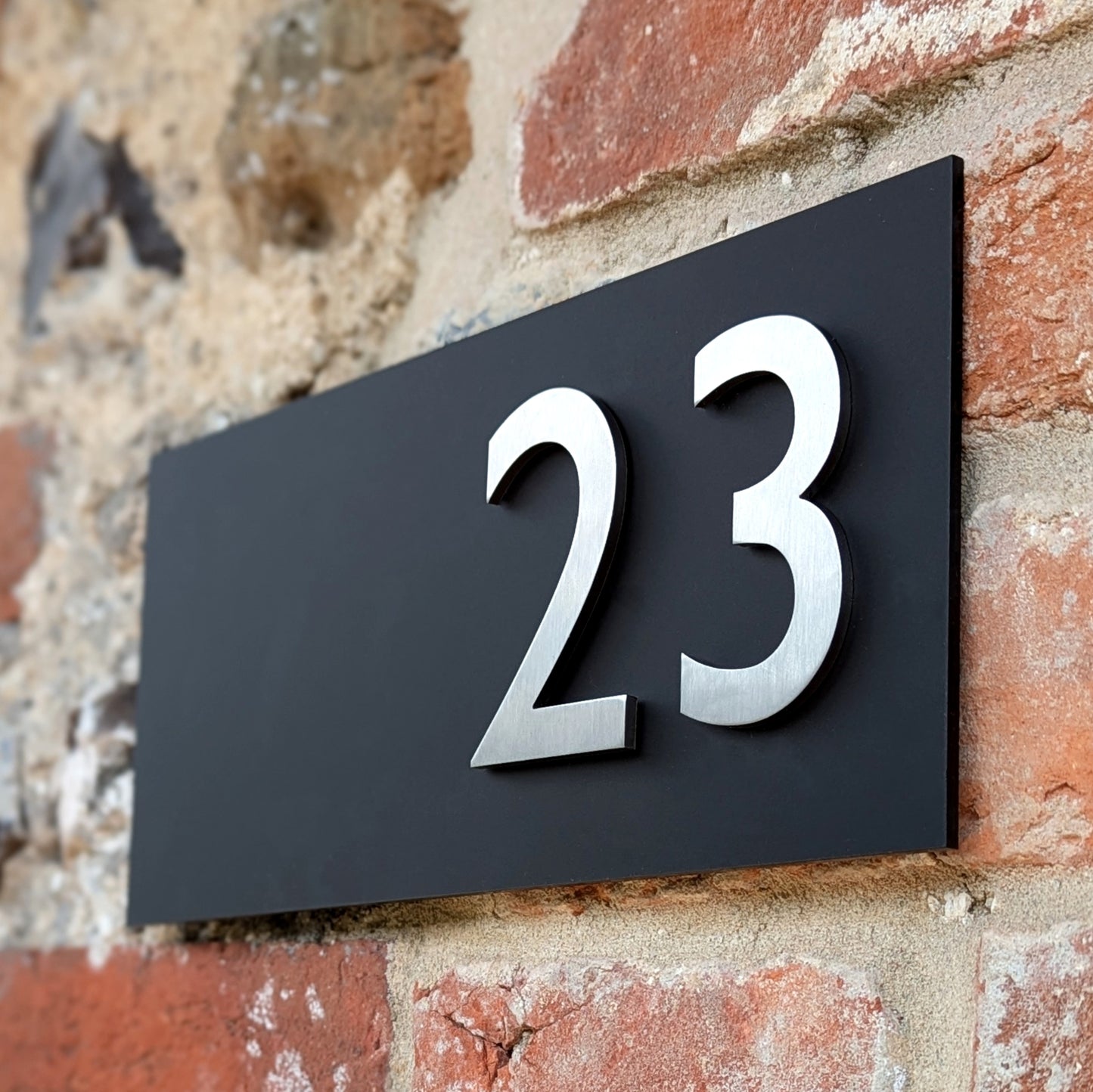 Stainless Steel House Numbers, mounted onto matt black sign, optional arrows and hyphens. small size