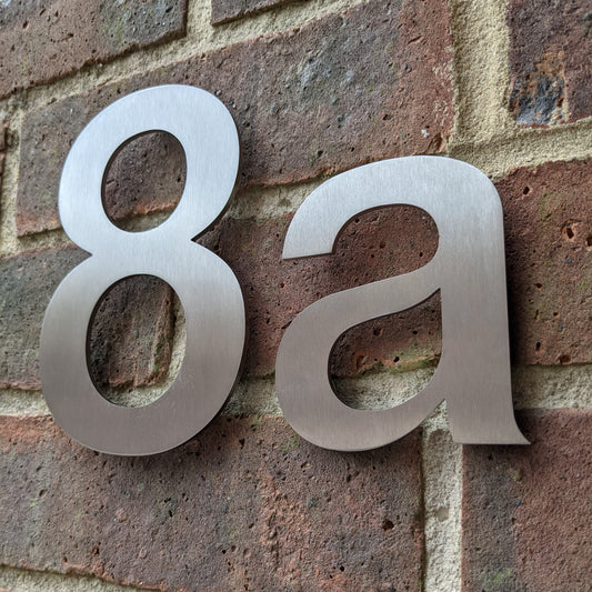 Stainless steel house number , house number , Helvetica house number , Stainless steel door number , modern house number , contemporary house number , house number made in the UK , Helvetica , hand finished house numbers